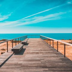 beach-bench-boardwalk-clouds-462024